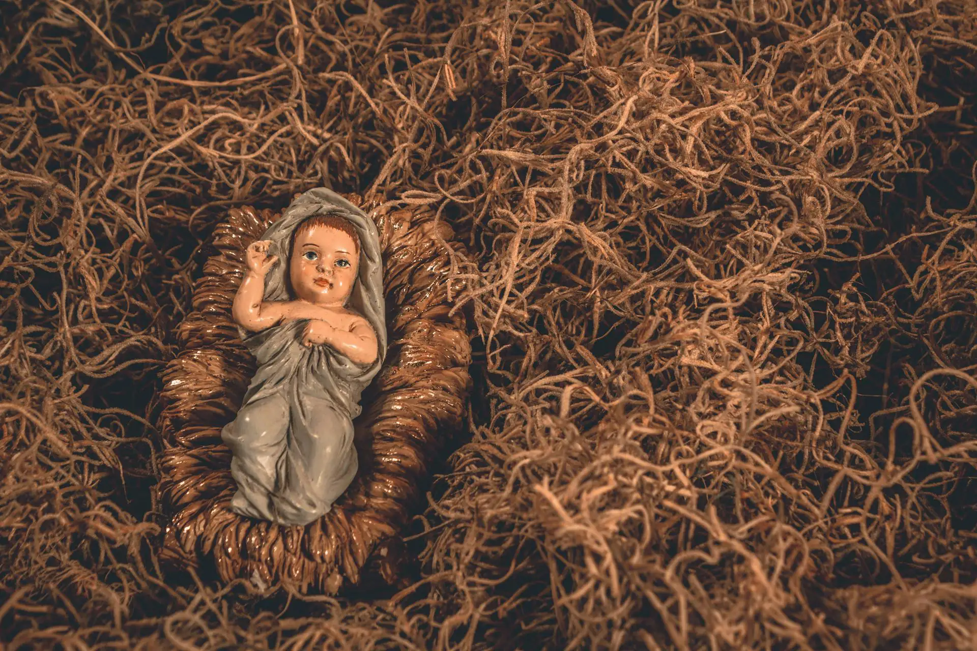 Baby Jesus amidst the hay