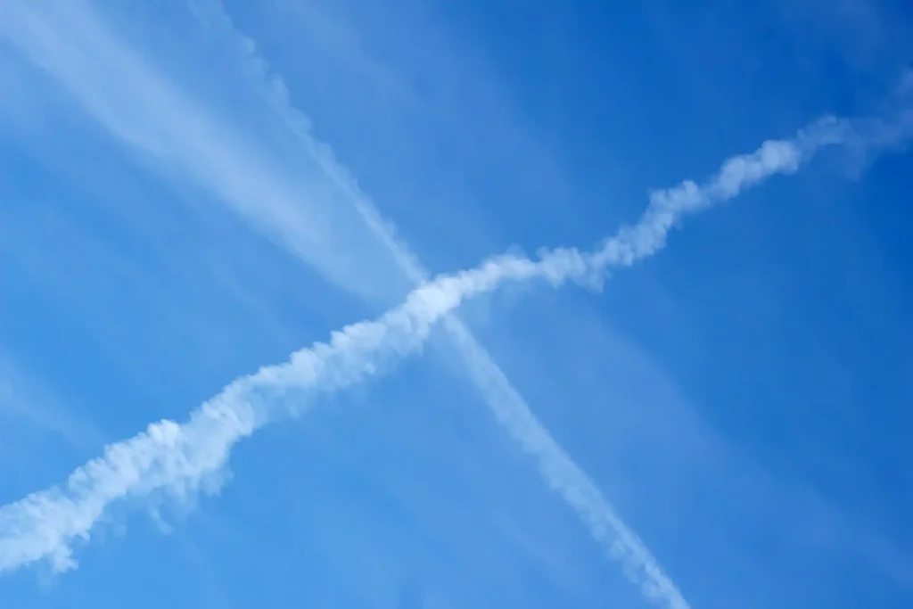 Sign of cross in the sky made by vapour trails